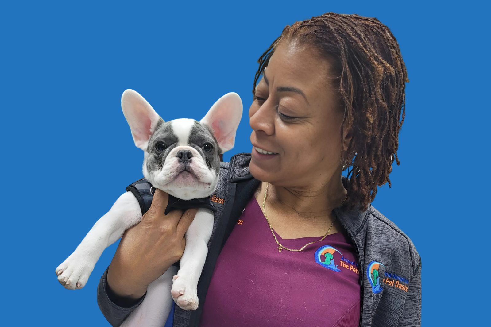 Dr. Sharon Brown holding a French bulldog.